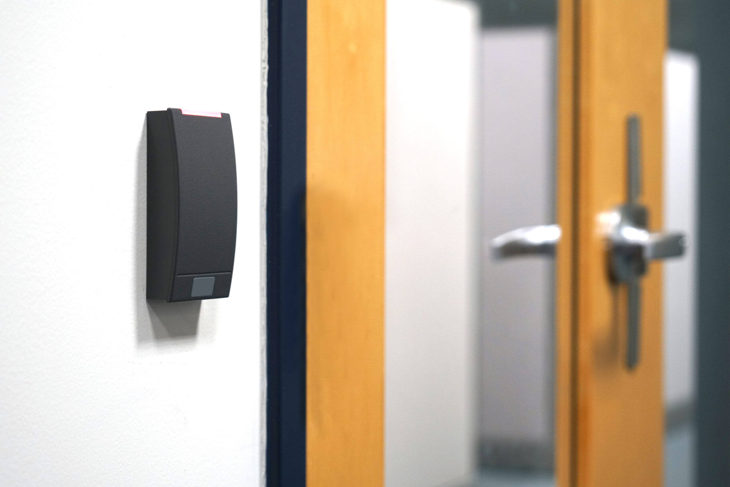door entrance card reader of security system in the office building